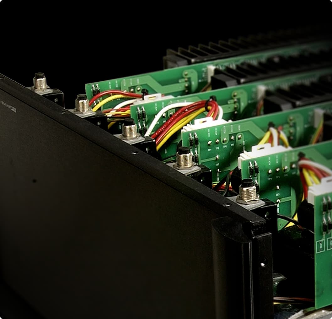 Image of the Anthem Statement P Series amplifier with its top cover removed, revealing internal components.