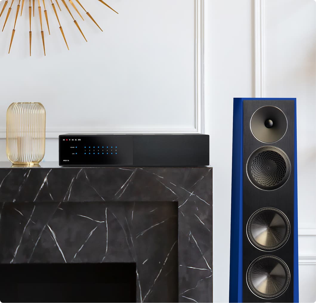 MDX-16 amplifier displayed with Paradigm Founder Series speakers in home theater environment